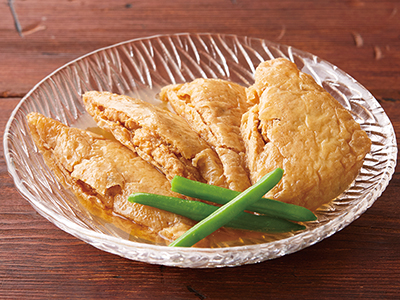 きつねで包んだ味付けがんも写真